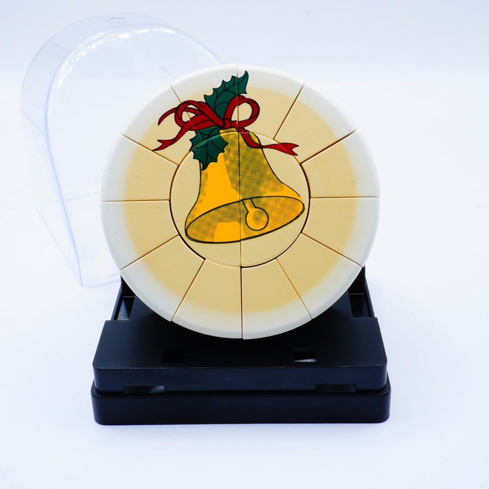 Christmas Bell Puck (White & Yellow) (IBEA)